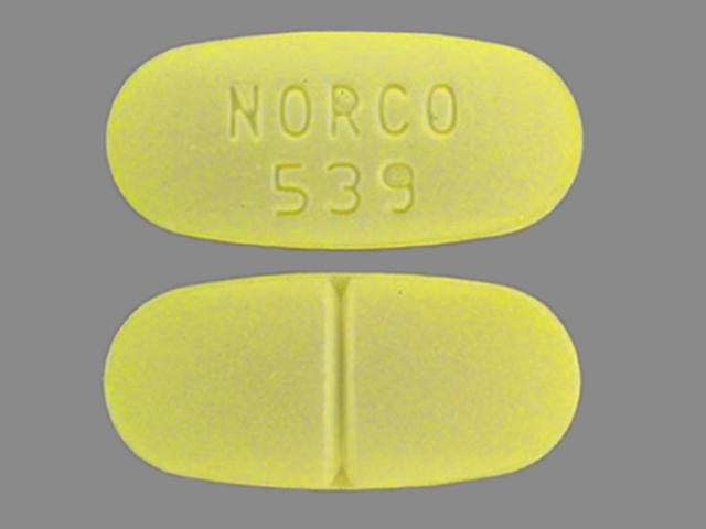 Zdjęcie podłużnych żółtawych tabletek z nadrukiem nazwy Norco